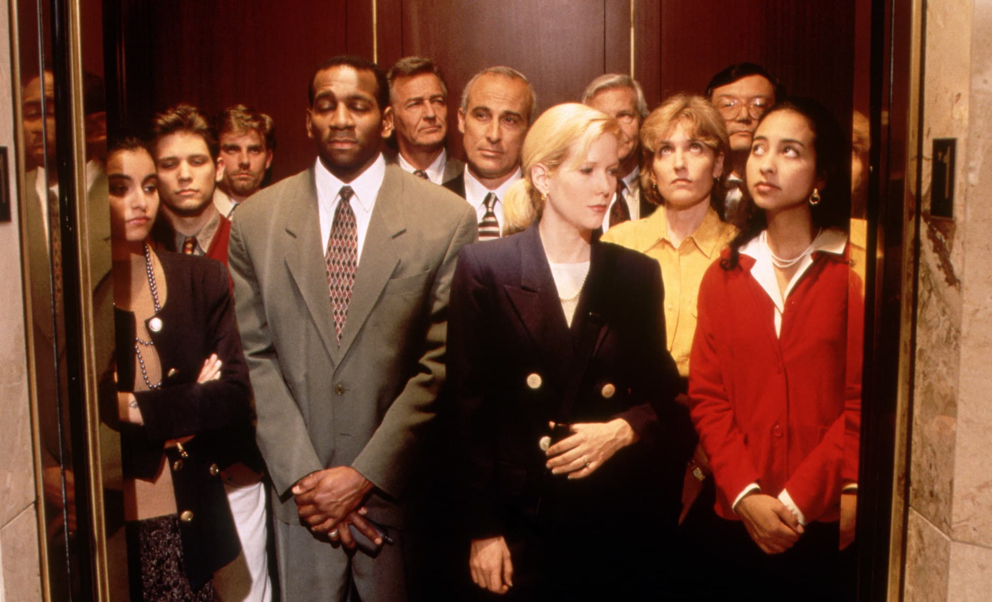 group of people in the elevator